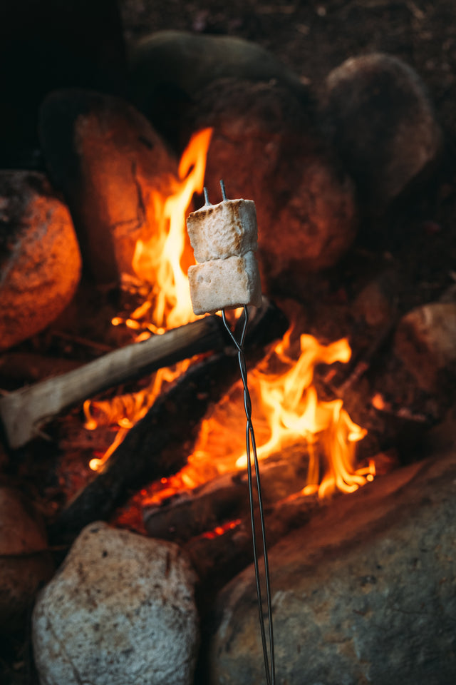handcrafted vermont marshmallows toasting over a campfire